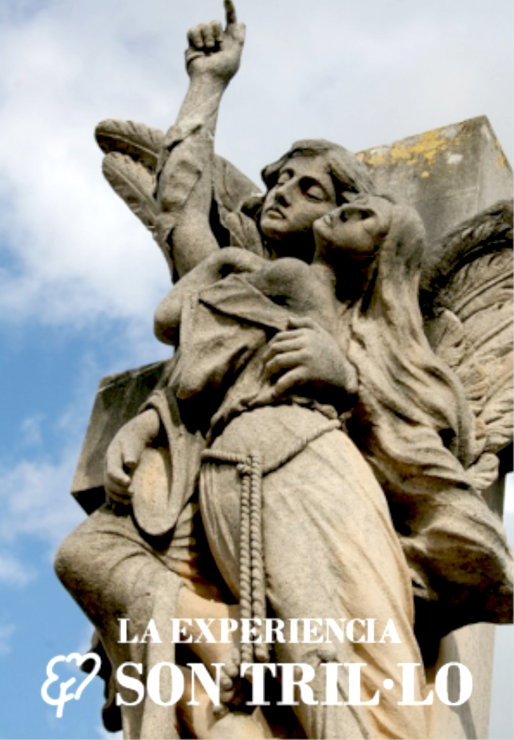 Stone monument of two angelic figures at Palma’s cemetery, part of the “Night of Souls” guided tour.