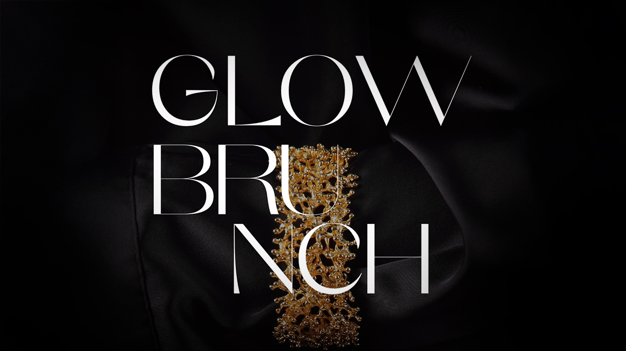 The text “Glow Brunch” over a black background with a gold jewelry piece.
